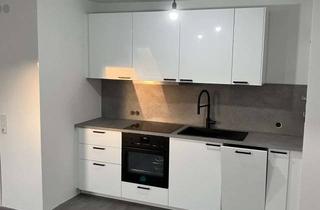 Wohnung mieten in 72622 Nürtingen, Wohnen mit Charakter: Zwei-Zimmer-Dachgeschosswohnung im Zentrum Nürtingens mit EBK und Stellplatz