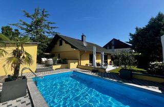 Einfamilienhaus kaufen in 67354 Römerberg, Freistehendes Einfamilienhaus mit Pool, Sauna und vielseitigen Nutzflächen