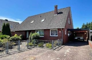 Einfamilienhaus kaufen in 26802 Moormerland, Attraktives Einfamilienhaus mit großem Grundstück im Ortskern von Warsingsfehn