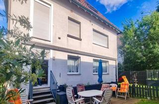Haus kaufen in 63128 Dietzenbach, Ein Haus für die Zukunft. Drei Wohnungen. Viele Möglichkeiten.