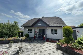 Einfamilienhaus kaufen in 34379 Calden, Einfamilienhaus mit schönem Gartenbereich in attraktiver Lage von Calden-Westuffeln!