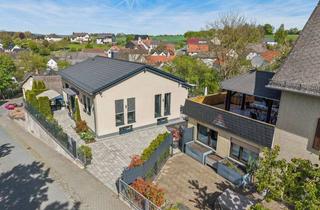 Einfamilienhaus kaufen in 35796 Weinbach, Zwei Häuser auf einem Grundstück - Vielseitiges Immobilienensemble