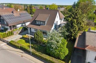 Einfamilienhaus kaufen in 35423 Lich, Großzügiges Ein-/Zweifamilienhaus mit weitläufigem Grundstück und vielfältigen Nutzungsmöglichkeiten