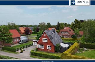 Einfamilienhaus kaufen in 26532 Großheide, Einfamilienhaus in Südarle mit Doppelgarage und Garten