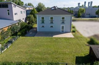 Haus kaufen in 85241 Hebertshausen, Wohnen und Arbeiten perfekt vereint!Modernes Wohn- und Gewerbeobjekt mit Betriebsleiterwohnung