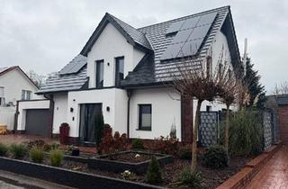 Einfamilienhaus kaufen in 49593 Bersenbrück, Bersenbrück - Modernes Einfamilienhaus mit Doppelgarage zu verkaufen