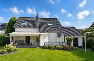 Einfamilienhaus kaufen in 50769 Köln, Köln - Freistehendes Familienhaus mit großem Garten in Köln-Roggendorf