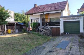 Haus kaufen in 64521 Groß-Gerau, Groß-Gerau - Haus mit großem Grundstück zu verkaufen