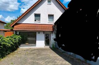 Doppelhaushälfte kaufen in 49324 Melle, Melle - Doppelhaushälfte mit Ladengeschäft und Garten in Melle Mitte
