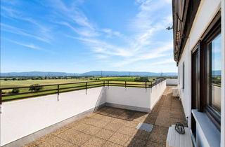 Wohnung kaufen in 68723 Oftersheim, Hoch hinaus in Oftersheim – saniertes Penthaus mit beeindruckender Aussicht, EBK und TG-Stellplatz!