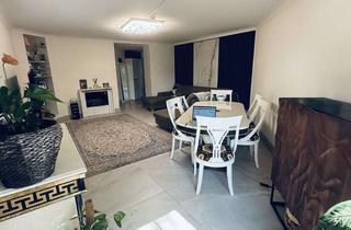 Wohnung kaufen in 65232 Taunusstein, Modernisierte 3-Zimmer-Erdgeschosswohnung mit Garten in Taunusstein-Hambach