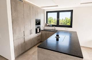 Wohnung kaufen in 79364 Malterdingen, Moderne 5-Zimmer-Wohnung mit hochwertiger Ausstattung und Garten am Dorfbach