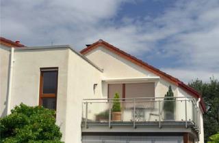 Wohnung kaufen in 68526 Ladenburg, Attraktive Eigentumswohnung mit zwei Balkonen und Ausblick auf die Bergstraße