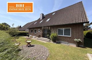 Einfamilienhaus kaufen in 24558 Henstedt-Ulzburg, Einfamilienhaus mit Einliegerwohnung auf sonnigem Grundstück