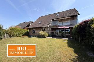 Einfamilienhaus kaufen in 24558 Henstedt-Ulzburg, Einfamilienhaus mit Einliegerwohnung auf sonnigem Grundstück