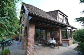 Einfamilienhaus kaufen in 24558 Henstedt-Ulzburg, Einfamilienhaus mit Vollkeller, einem ausgebauten Spitzboden und Carport