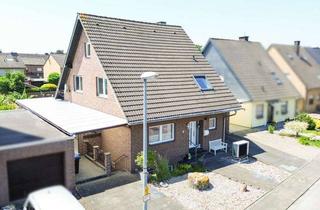Einfamilienhaus kaufen in 50181 Bedburg, Charmantes Einfamilienhaus mit Swimmingpool, Doppelgarage und liebevoll angelegtem Garten