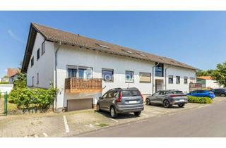 Wohnung kaufen in 35423 Lich, Gepflegte Drei-Zimmer-Erdgeschosswohnung mit zwei Stellplätzen und idyllischem Gemeinschaftsgarten