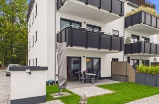 Wohnung kaufen in 61250 Usingen, Usingen: Barrierefrei wohnen – Modern, komfortabel und mit eigenem Gartenanteil
