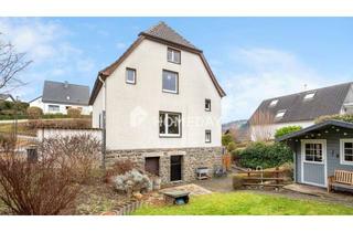 Haus kaufen in 59872 Meschede, Teilvermietetes Zweifamilienhaus mit sonnigem Garten auf ca. 940 m² Grundstück