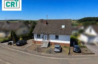 Haus kaufen in 35329 Gemünden, Kapitalanlage mit drei Wohneinheiten auf großzügigem Grundstück