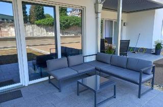 Wohnung kaufen in 52351 Düren, Düren - Vermieteter Neubau-Traum: 3 Zimmer, KfW 55, Terrasse & Tiefgarage