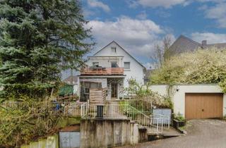 Haus kaufen in 58332 Schwelm, Attraktives Zweifamilienhaus mit Anliegerwohnung, Garagen und Garten!