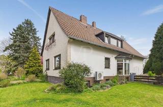 Einfamilienhaus kaufen in 31303 Burgdorf, Blick ins Grüne! Einfamilienhaus mit Einliegerwohnung und Keller