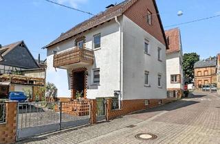 Einfamilienhaus kaufen in 65719 Hofheim am Taunus, Großzügiges Einfamilienhaus mit Terrasse, Balkon und vielseitig nutzbaren Räumen in Hofheim