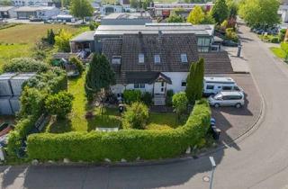 Haus kaufen in 79418 Schliengen, Drei Wohnungen – ein Investment: Gepflegte Kapitalanlage im Markgräflerland