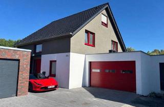 Einfamilienhaus kaufen in Am Ruthenfeld 22a, 59302 Oelde, Farbenfrohes Einfamilienhaus (Bj. 2024) mit moderner Technik, Pool, Sauna, Jacuzzi und großer Garage