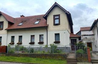Doppelhaushälfte kaufen in 98527 Suhl, Charmante Doppelhaushälfte mit Garten und vielseitigen Gestaltungsmöglichkeiten