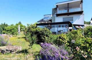 Einfamilienhaus kaufen in 63801 Kleinostheim, Exklusives Dreifamilienhaus in Kleinostheimer Bestlage Im Wingert mit riesiger Terrasse und Loggia