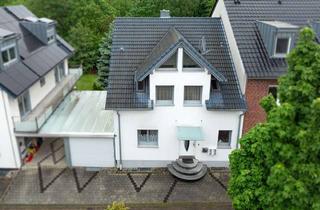 Doppelhaushälfte kaufen in 50769 Seeberg, Großzügige Doppelhaushälfte mit weitläufigem Garten und Garage in Seenähe