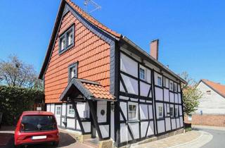 Haus kaufen in 38690 Vienenburg, Charmantes Fachwerkhaus mit Einliegerwohnung, Gartenidylle & viel Potenzial in Weddingen
