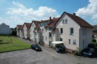 Mehrfamilienhaus kaufen in 37691 Boffzen, Mehrfamilienhaus-Ensemble mit 12 Wohneinheiten und Mietentwicklungschance in Boffzen