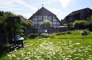 Einfamilienhaus kaufen in 51381 Lützenkirchen, Einfamilienhaus im Fachwerkstil mit großer sonniger Gartenoase, in Leverkusen-Lützenkirchen!