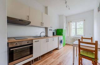 Wohnung kaufen in 13351 Wedding, Objektbeschreibung Charmanter Altbau mit viel Licht, großzügiger Wohnküche und Blick ins Grüne