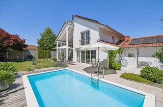 Haus kaufen in 84453 Mühldorf, Großzügigkeit neu definiert – Architektur-Highlight mit Galerie, Pool-Oase und privater Gartenidylle
