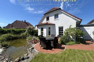 Einfamilienhaus kaufen in 30952 Ronnenberg, Weiße Fassade, grünes Paradies: freistehendes Einfamilienhaus mit Garage & Traumgarten in Ronnenberg