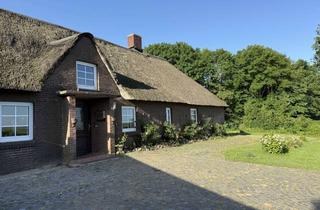 Haus kaufen in 25889 Uelvesbüll, Reetdachhaus am Porrendeich in Uelvesbüll auf Eiderstedt - Deichlage nahe der Wehle
