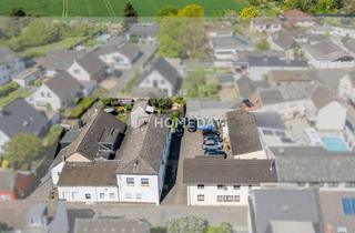 Anlageobjekt in 53757 Sankt Augustin, Kapitalanlage mit Charakter: Ensemble aus 3 Häusern auf 1.367 Quadratmeter Grundstück