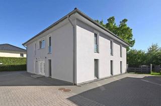 Anlageobjekt in 22962 Siek, Zeitlos - modernes Zinshaus nach aktuellen energetischen Standards in begehrter Lage von Siek.
