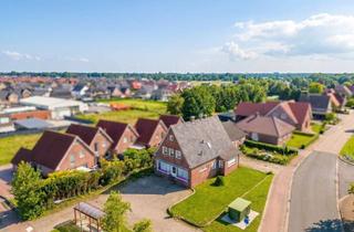 Haus kaufen in 26817 Rhauderfehn, Attraktive Kapitalanlage: Vermietetes Wohn- und Geschäftshaus mit Entwicklungspotenzial !
