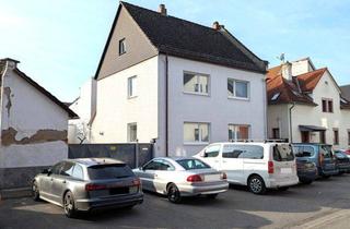 Einfamilienhaus kaufen in 65474 Bischofsheim, Einfamilienhaus mit Anbau, Doppelgarage und Stellplätzen