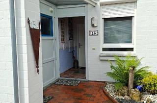 Wohnung kaufen in 26409 Wittmund, Wittmund - Eigentumswohnung mit Garten