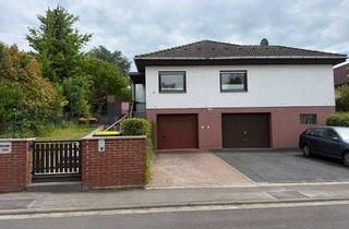Wohnung kaufen in 35415 Pohlheim, Wohnung mit Haus-Charakter mit separatem Eingang, eigenem Garten und Garage mit direktem Zugang