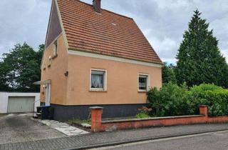 Einfamilienhaus kaufen in 66450 Bexbach, Gepflegtes freistehendes Einfamilienhaus mit großem Grundstück und 3 Garagen