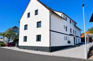 Mehrfamilienhaus kaufen in 63619 Bad Orb, Kernsaniertes Mehrfamilienhaus mit 7 Wohneinheiten + 7 Garagen + 3 PKW-Außenstellplätzen