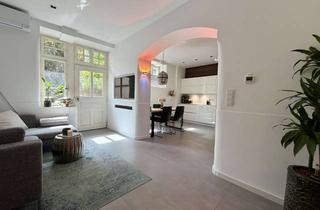 Wohnung kaufen in 68165 Schwetzingerstadt, Stilvoll saniertes Souterrain-Juwel mit Terrasse & Garten – Mannheim Oststadt